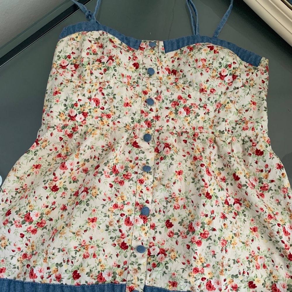 floral top with denim detailing